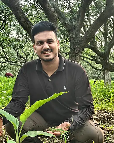 Vivek Chambial checking young haldi plants